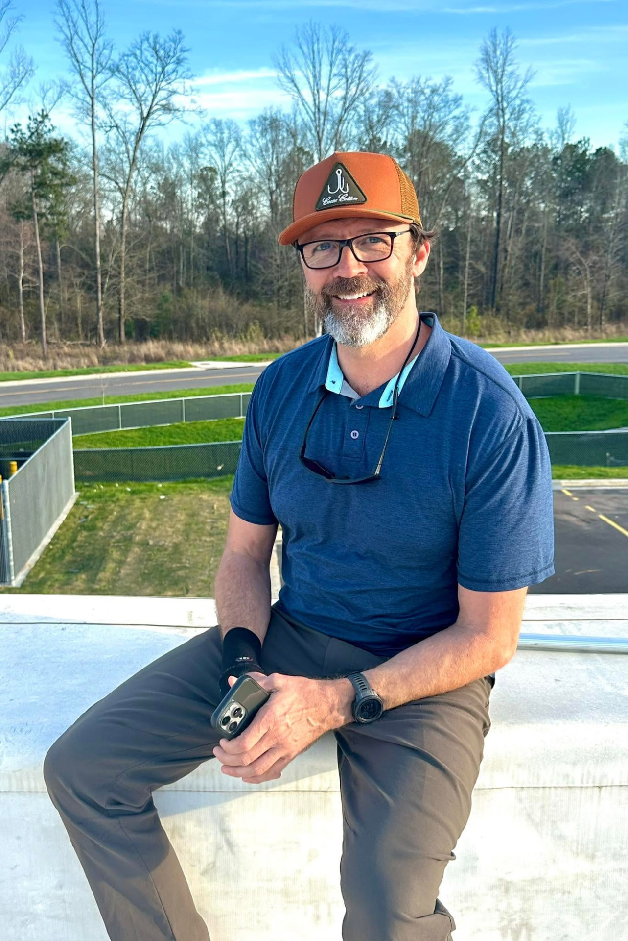 Gary, owner of Saturn 5 Roofing, on a commercial rooftop in Alabama